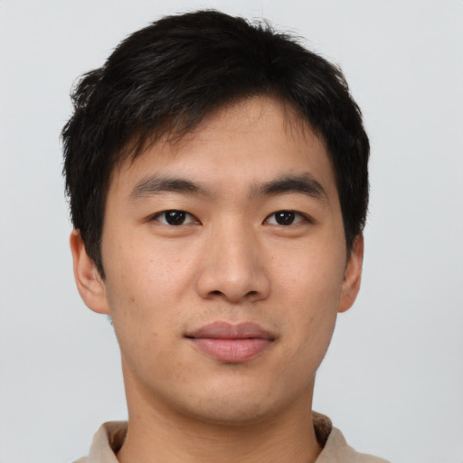 Neutral asian young-adult male with short  brown hair and brown eyes