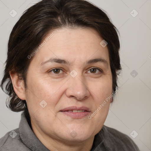 Joyful white adult female with medium  brown hair and brown eyes