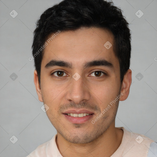 Joyful white young-adult male with short  black hair and brown eyes