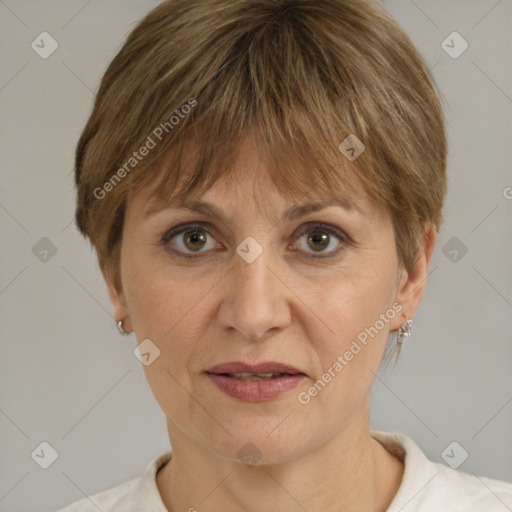 Joyful white adult female with short  brown hair and brown eyes