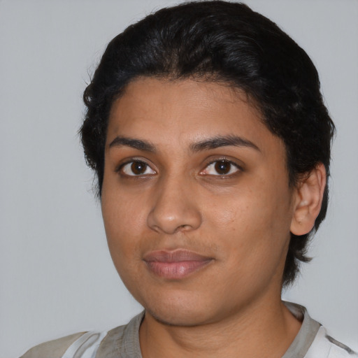Neutral latino young-adult female with medium  black hair and brown eyes