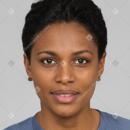 Joyful black young-adult female with short  black hair and brown eyes