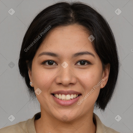 Joyful latino young-adult female with medium  brown hair and brown eyes