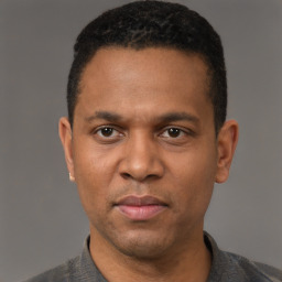 Neutral latino adult male with short  black hair and brown eyes