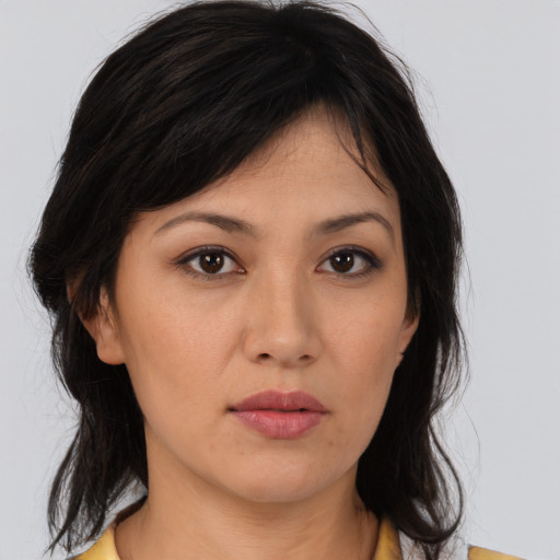 Neutral white young-adult female with medium  brown hair and brown eyes