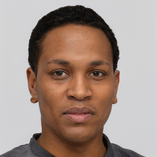 Neutral black young-adult male with short  black hair and brown eyes
