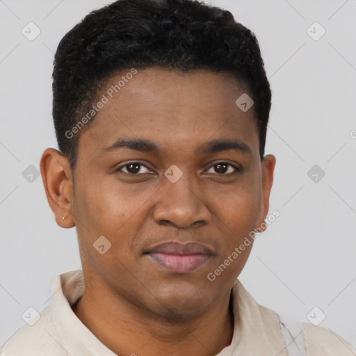 Joyful black young-adult male with short  brown hair and brown eyes
