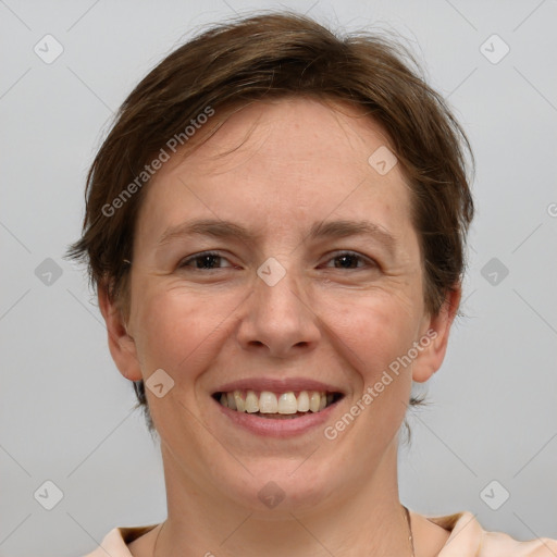 Joyful white adult female with medium  brown hair and grey eyes