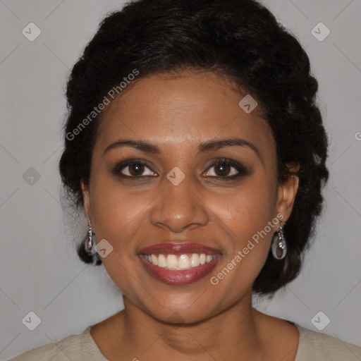 Joyful black young-adult female with medium  brown hair and brown eyes