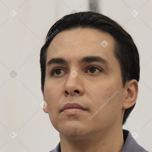 Neutral white young-adult male with short  black hair and brown eyes