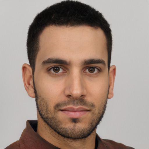 Neutral latino young-adult male with short  brown hair and brown eyes