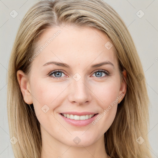 Joyful white young-adult female with long  brown hair and blue eyes