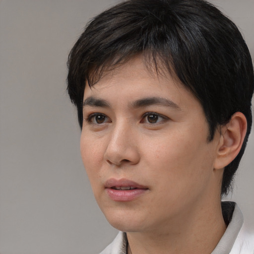Neutral white young-adult female with short  black hair and brown eyes