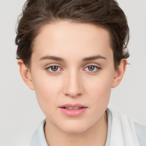 Neutral white young-adult female with short  brown hair and brown eyes