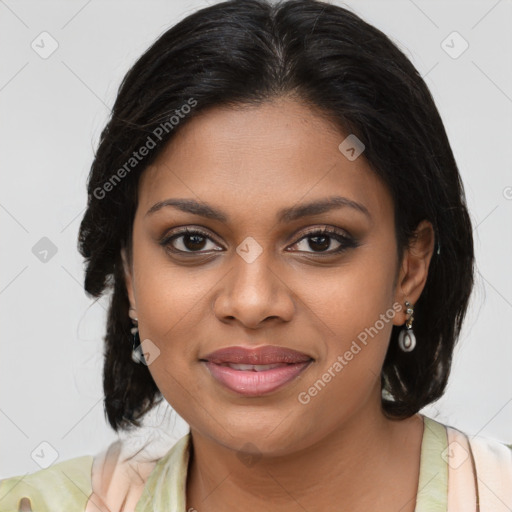 Joyful black young-adult female with long  brown hair and brown eyes