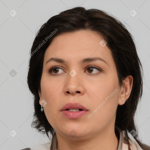 Neutral white young-adult female with medium  brown hair and brown eyes