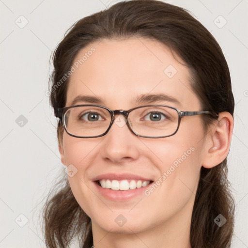 Joyful white young-adult female with medium  brown hair and brown eyes