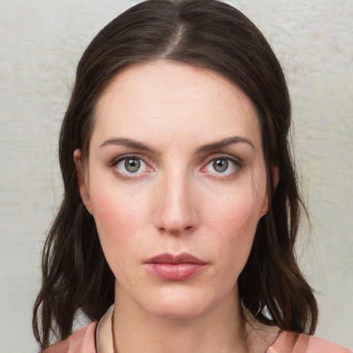 Neutral white young-adult female with medium  brown hair and grey eyes