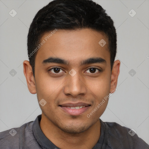 Joyful latino young-adult male with short  black hair and brown eyes