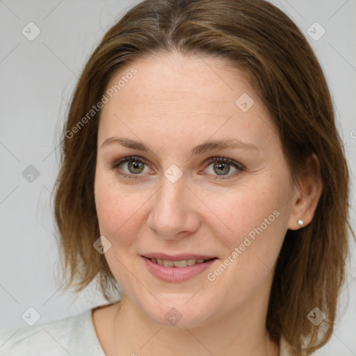 Joyful white young-adult female with medium  brown hair and green eyes