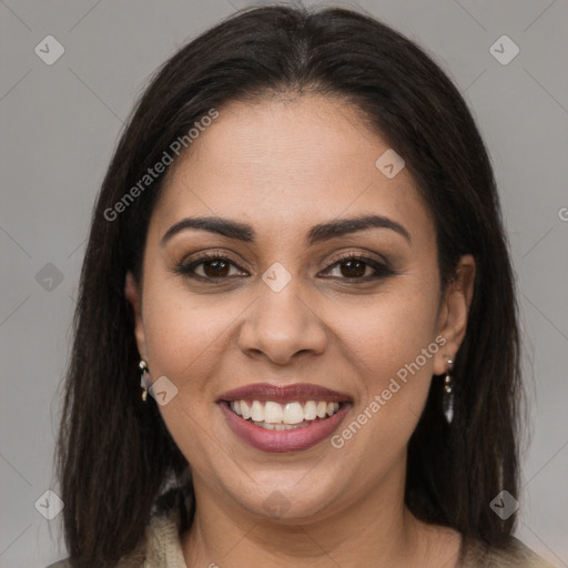 Joyful latino young-adult female with long  brown hair and brown eyes