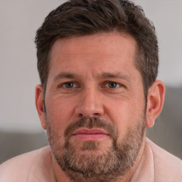Neutral white adult male with short  brown hair and brown eyes