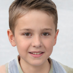 Joyful white child male with short  brown hair and brown eyes