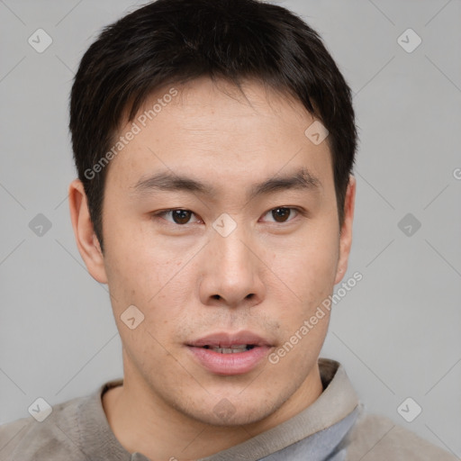 Neutral asian young-adult male with short  brown hair and brown eyes