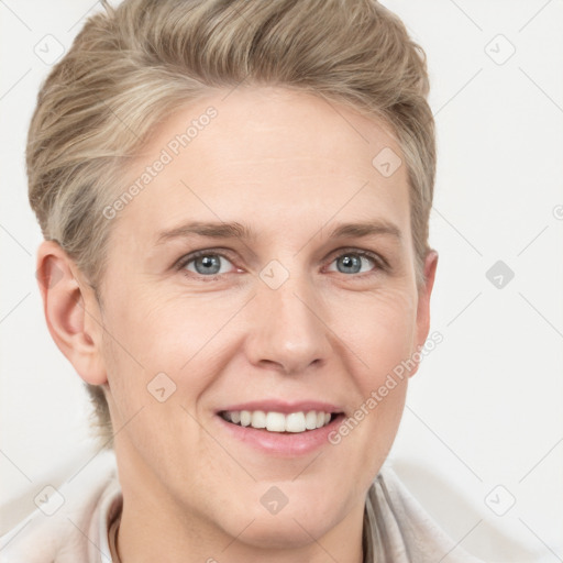 Joyful white adult female with short  brown hair and grey eyes