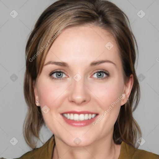 Joyful white young-adult female with medium  brown hair and blue eyes