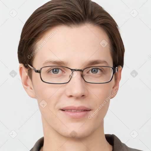 Joyful white young-adult female with short  brown hair and grey eyes