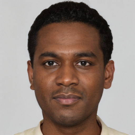 Neutral black young-adult male with short  black hair and brown eyes