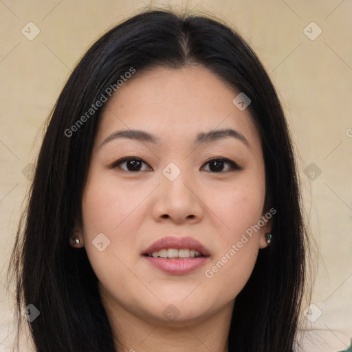 Joyful asian young-adult female with long  brown hair and brown eyes