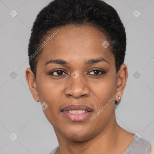 Joyful black young-adult female with short  black hair and brown eyes