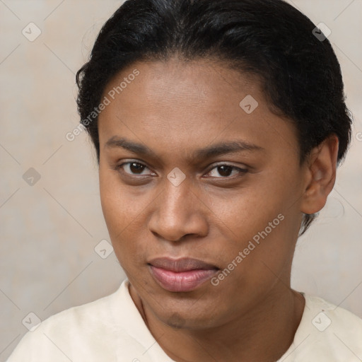 Joyful black young-adult female with short  brown hair and brown eyes