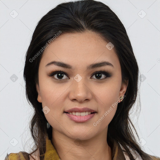 Joyful latino young-adult female with long  brown hair and brown eyes