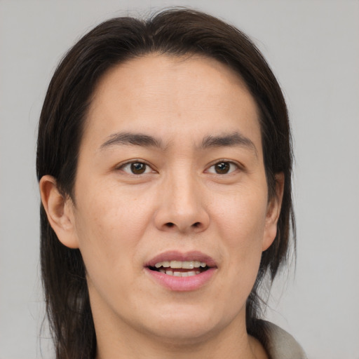 Joyful white young-adult male with medium  brown hair and brown eyes