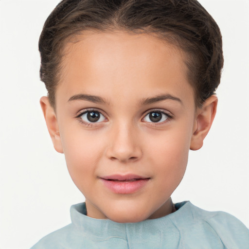Joyful white child female with short  brown hair and brown eyes