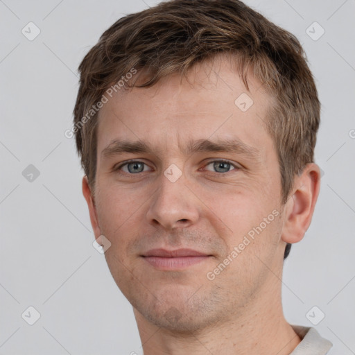 Neutral white young-adult male with short  brown hair and grey eyes