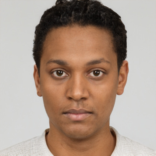 Neutral black young-adult male with short  black hair and brown eyes