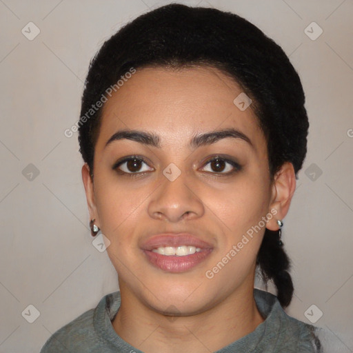 Joyful latino young-adult female with short  black hair and brown eyes