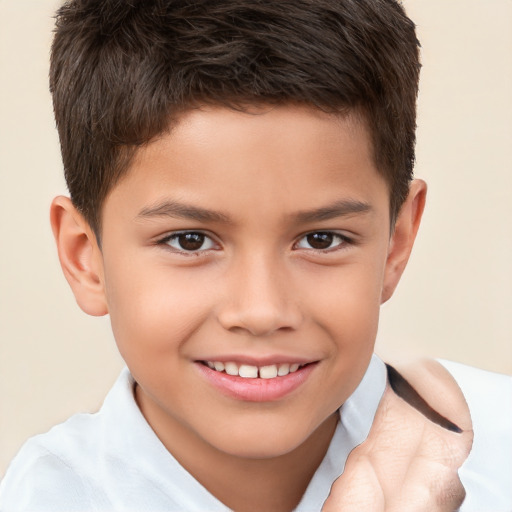 Joyful white child male with short  brown hair and brown eyes