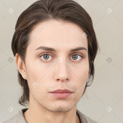 Neutral white young-adult female with medium  brown hair and grey eyes