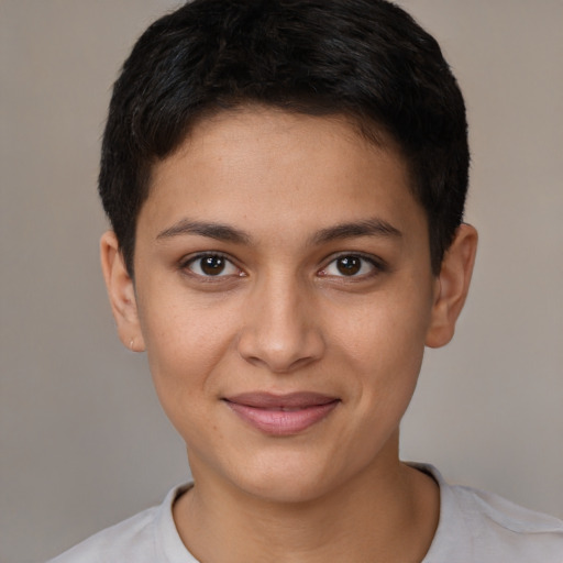 Joyful latino young-adult female with short  brown hair and brown eyes