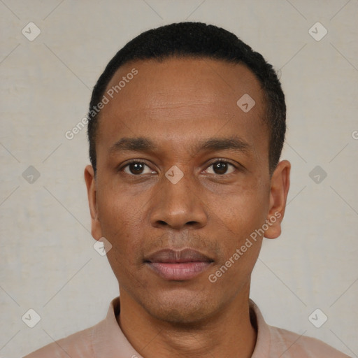 Neutral black young-adult male with short  black hair and brown eyes