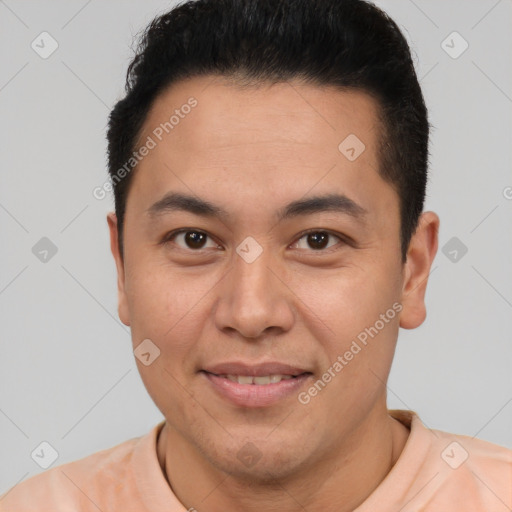 Joyful latino young-adult male with short  brown hair and brown eyes