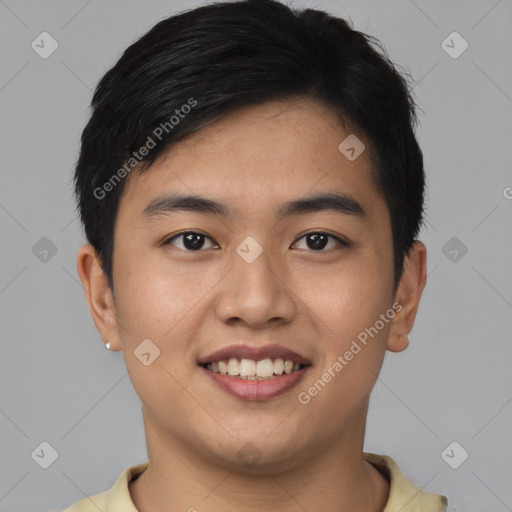 Joyful asian young-adult male with short  black hair and brown eyes