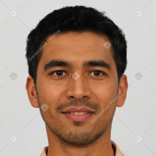 Joyful asian young-adult male with short  black hair and brown eyes