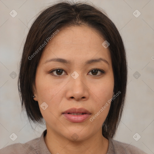 Neutral asian young-adult female with medium  brown hair and brown eyes