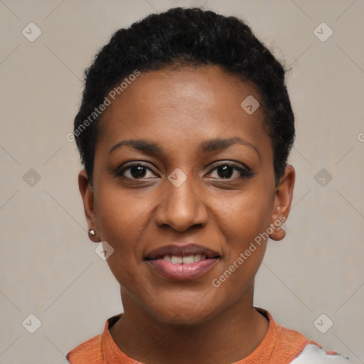 Joyful black young-adult female with short  black hair and brown eyes